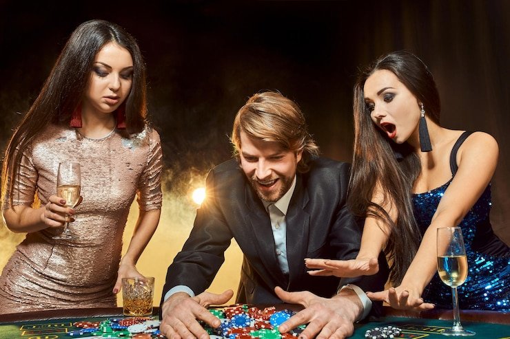 Live Lightning Dice dealer rolling three dice on broadcast studio table